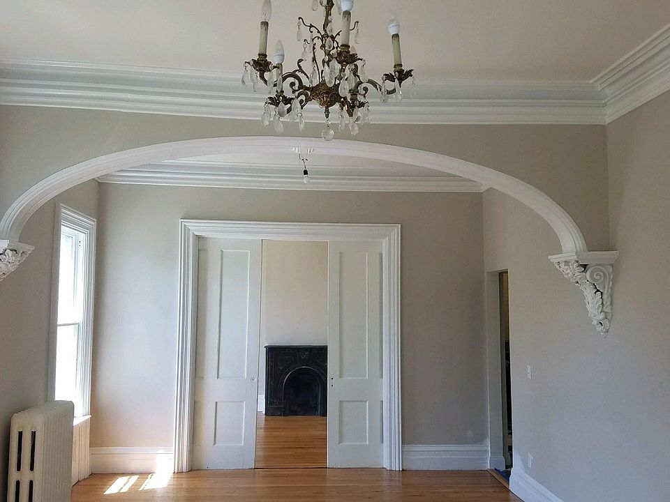 The gorgeous living room/dining room was once a ballroom.