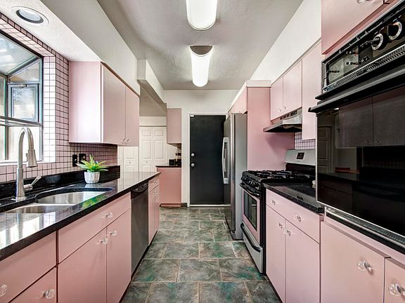 4th image of 6106 Bellamah Ave NE