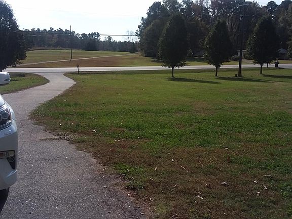 Large Front Yard with Paved Driveway