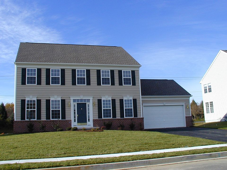 Colonial with partial brick front