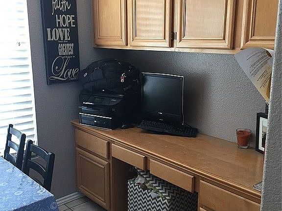4th image of 1012 S Tivoli Ct E