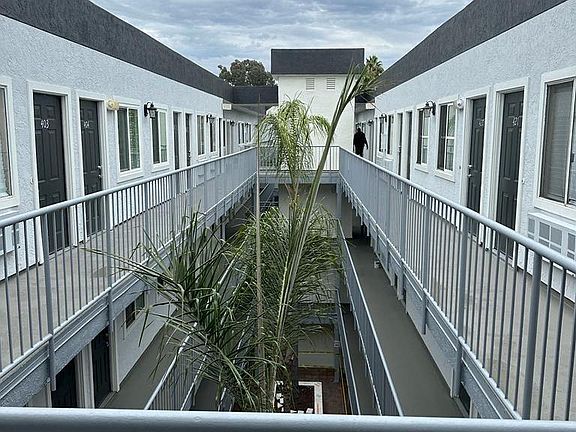 Top floor view of innear courtyard at the Atrium Apartments in downtown San Diego, CA.