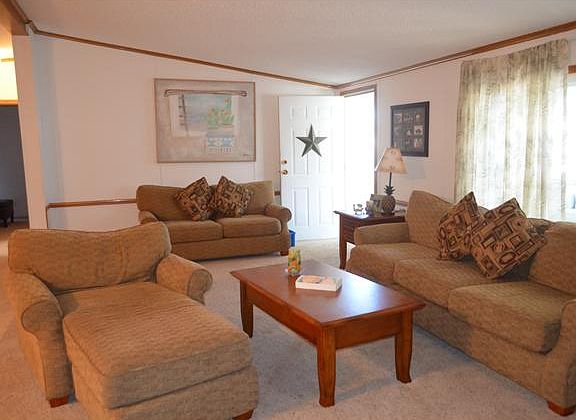 Great room open to kitchen and dining area