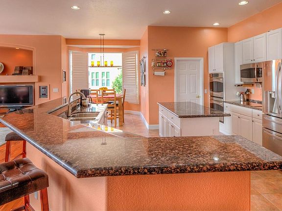 Great kitchen with granite countertops, newer cupboards, and high end appliances