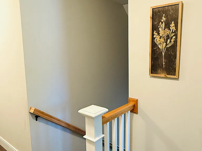 Second floor looking at stairway. Master bedroom and bathroom to the left. Two additional bedrooms to the right.
