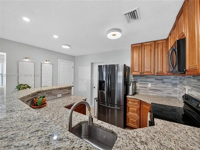 4311 SW 24th St — Photo 8