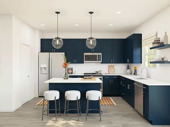 Kitchen with pendant lighting and floating shelves