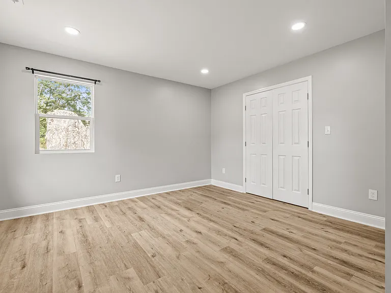 Family Room (separate from living room). French doors lead to walk-in laundry room.