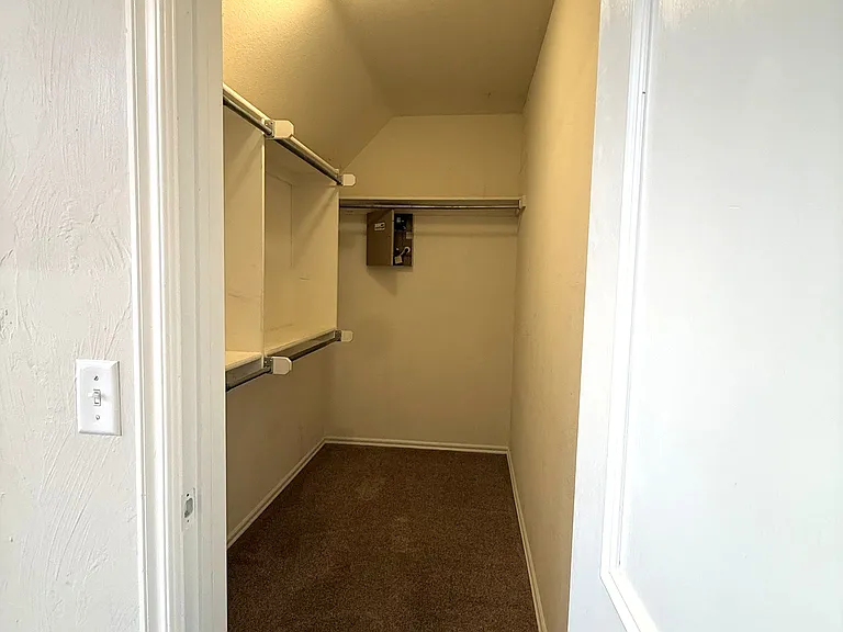 A beautiful, "wow factor" walk in closet for the third bedroom. Not common for extra bedrooms to have so much walk in ability and storage. My favorite!