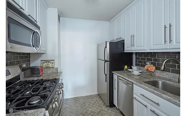 Sold by Douglas Elliman | media 13