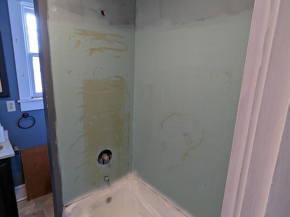 Bathtub and tub to ceiling tile (to be installed)