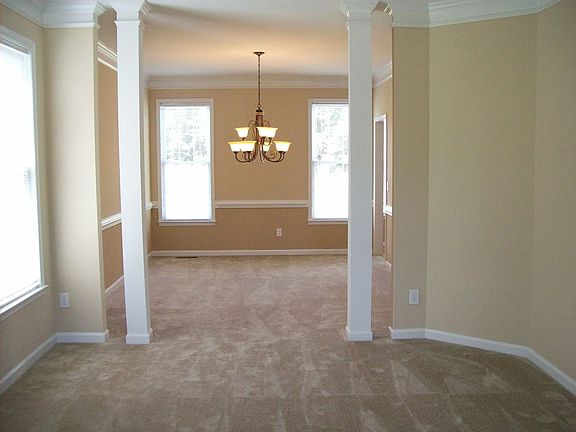 Open dining area & formal living room