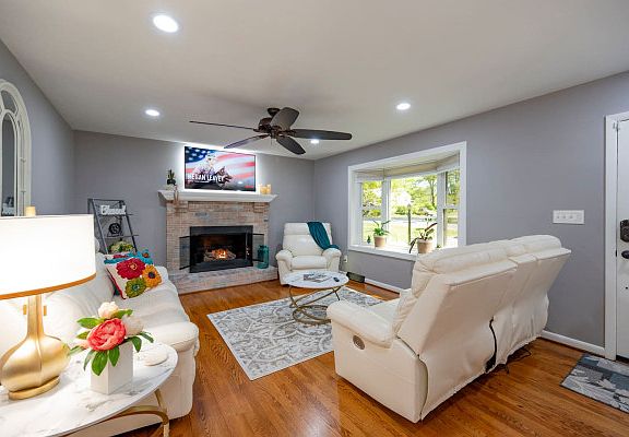 Gas Log Fireplace, TV on Pivotal Bracket, Recessed Lighting, Keyless Entry Front Door and Kitchen Door