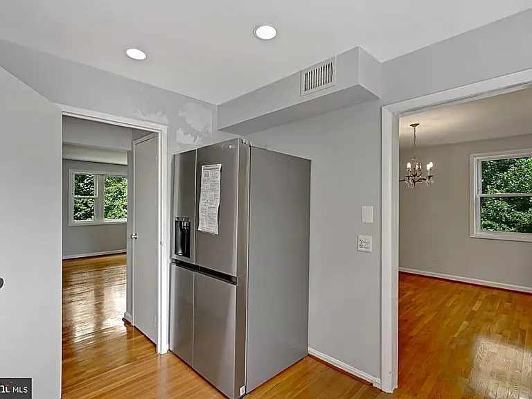 middle floor - kitchen - view of dining room and living room