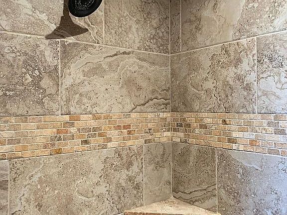 Master shower is spa-like