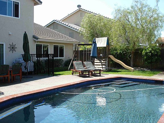 Play area and patio to the left