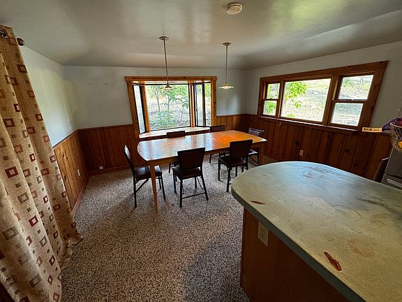 Dining area is part of the kitchen.