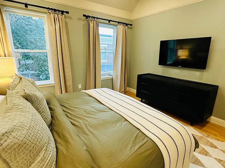 Front bedroom with big screen TV