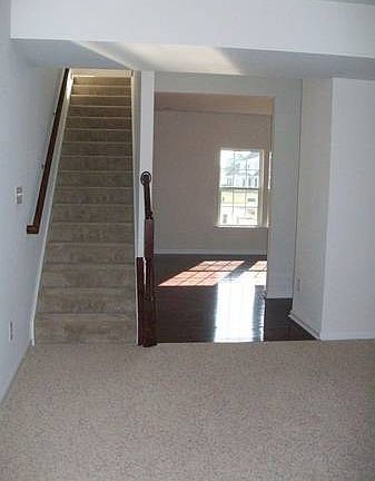 First Floor
						:
						Beautiful hard wood floors throughout front of house and leads into powder room.