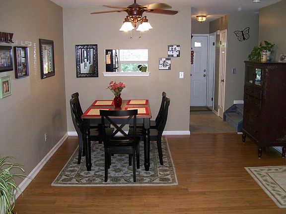 THE DINING ROOM HAS HARDWOOD FLOOR & PASS THROUGH TO KITCHEN!