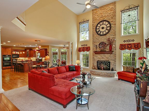 BEAUTIFUL TWO STORY FAMILY LIVING AREA THAT OPENS TO THE KITCHEN AND BUTLER PANTRY