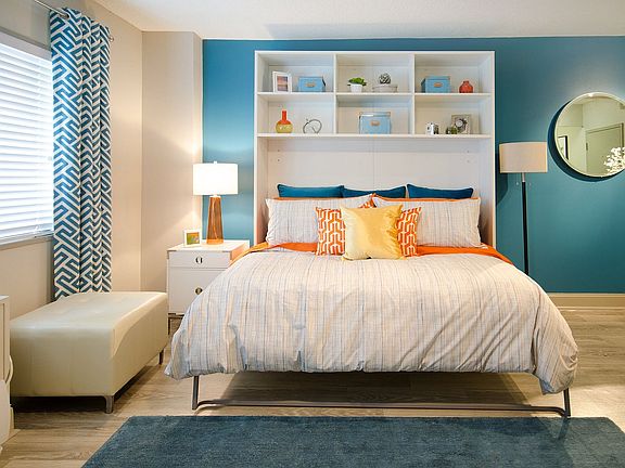 Bedroom with hardwood-style flooring