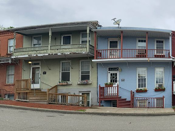 106 Pine St, Apt 2, is a two-story apartment in row houses.