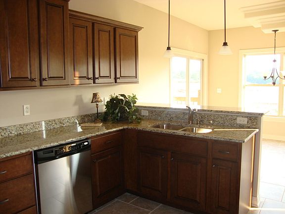 TONS of counter space, under cabinet lighting and granite.