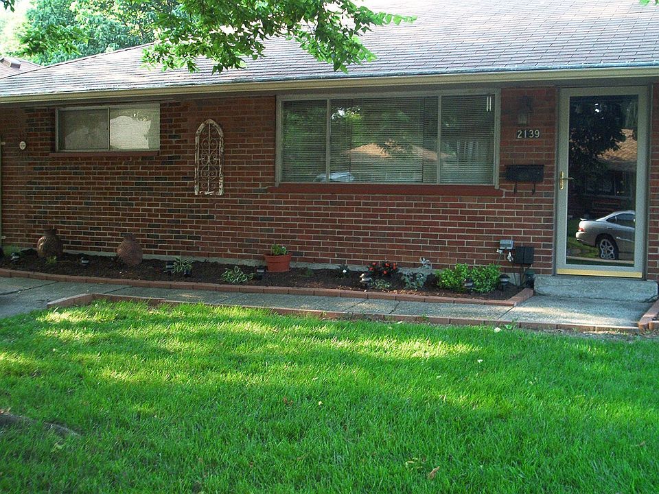 front left side by garage