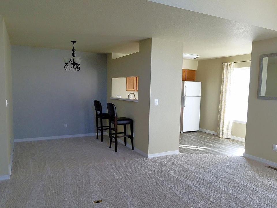 Dining room--back wall is muted gray