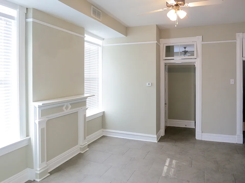 Hall off kitchen leads to bathroom and bedroom