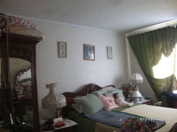 3rd image of 677 E 92nd St