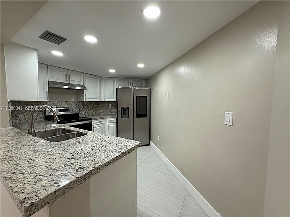5th image of 9405 Fontainebleau Blvd APT 113-22
