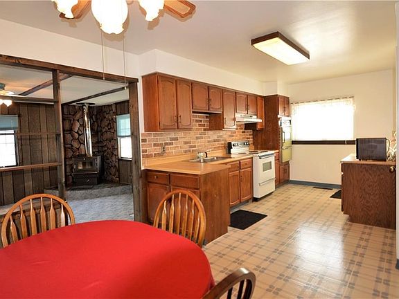 The Eat In Kitchen is adjacent to the large Family with Wood Burner Stove.