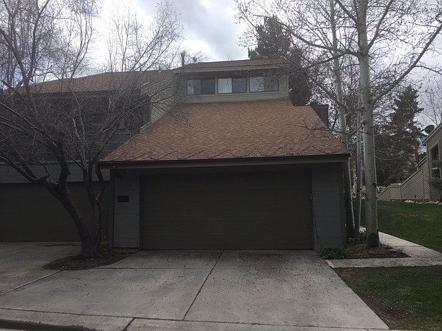 Front view of unit, garage