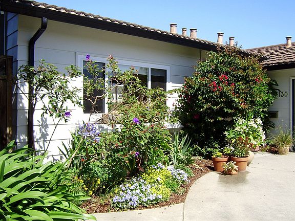 Front window faces English-style garden that gets plenty of morning sun