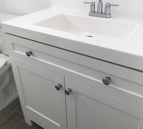 Brand new bathroom vanity and sink. New flooring.