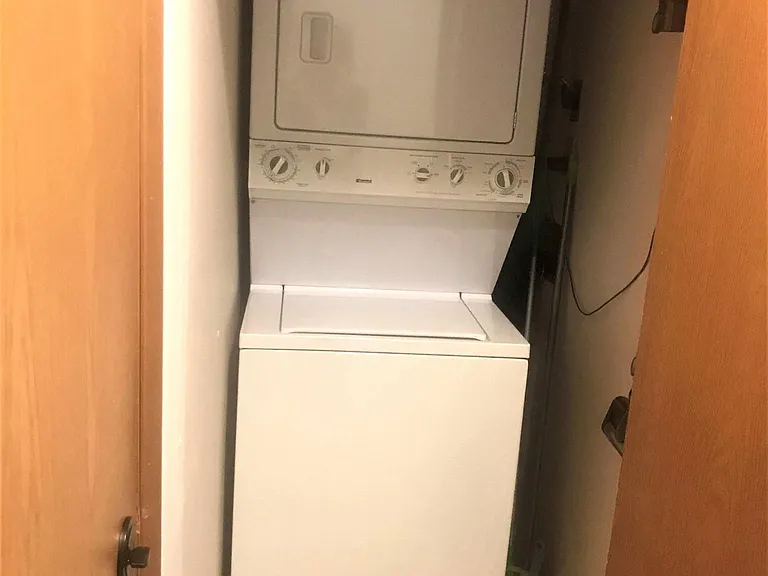 In unit laundry and extra storage.