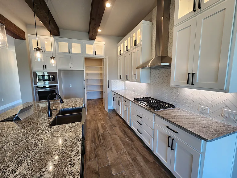 Kitchen with pantry door opened