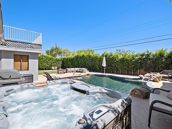 Always heated hot tub with strong jets.