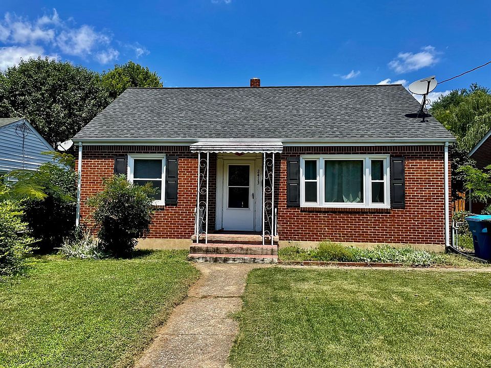 2413 Memorial Ave SW - 4 Bedrooms, Den, 1 Bath - 1,960 Square Feet (plus unfinished basement)! Fenced In Backyard! In Unit W/D! Central Air! Pets Allowed! Walk to Everything Grandin Village has to Offer! Front stoop and awning to be painted black.