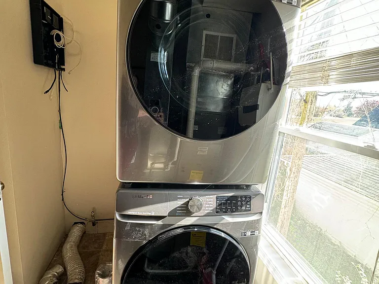 Brand new Samsung washer and dryer in unit.