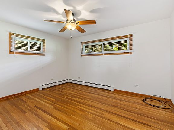 Refinished Hardwood Floors, Freshly Painted and Ceiling Fan w/Light