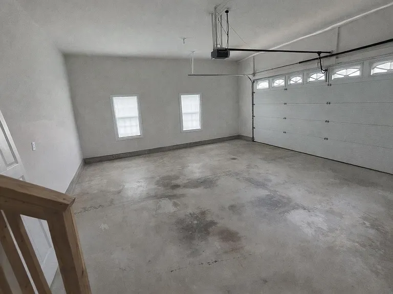 Two car garage with entry to house