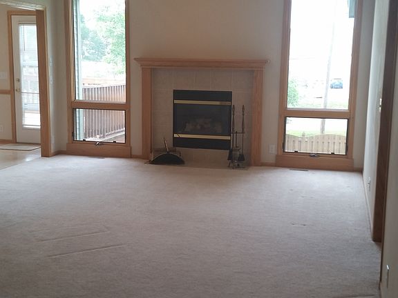 Family room with electric start gas log fireplace