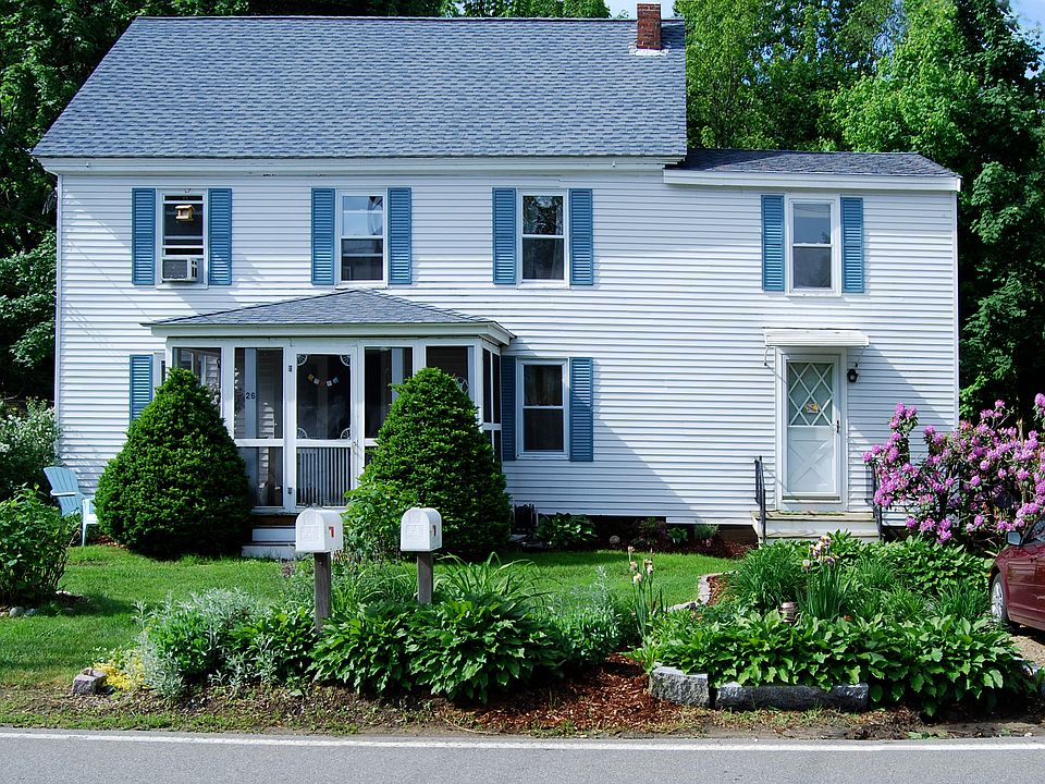 Main house and apartment on right, 2 of street parking spaces