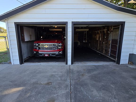 Attached 2 Car Garage will accommodate full size pickup, Full size freezer included