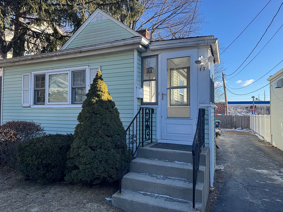 Main entrance with a closed glass patio.