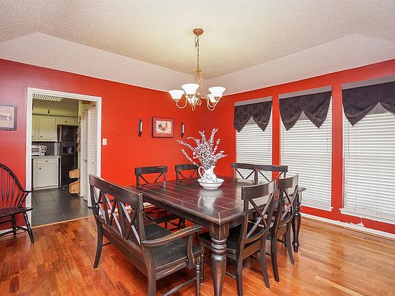 Three large windows will allow the natural light in as you desire. Door to kitchen is on the left