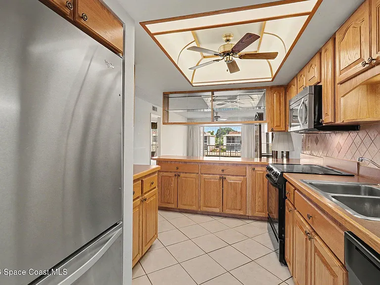 2135 N Courtenay Pkwy #241 — Photo 15